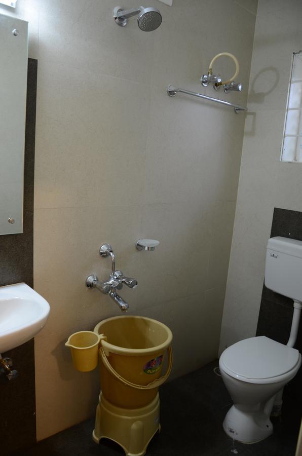 Hotel Vasantham Palace Ooty Bagian luar foto